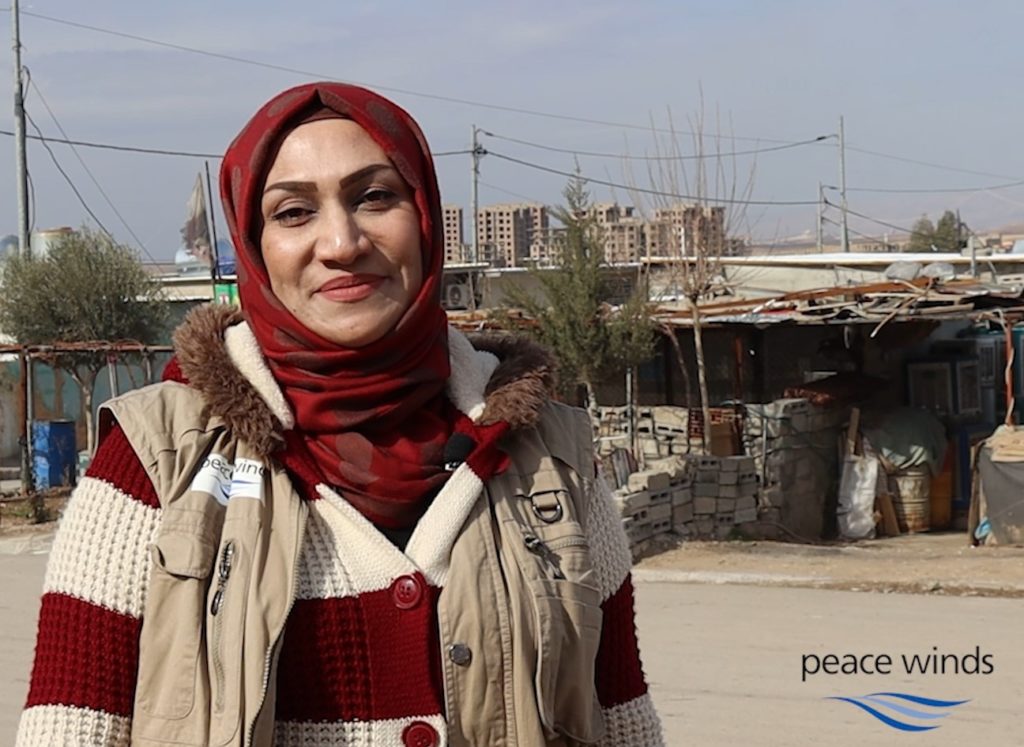 Peace Winds' Supervisor Engineer Mrs. Sipal Khalid Abdi stands outside in Duhok, Iraq